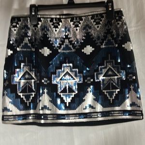 Beautiful black, blue & silver sequin mini skirt. 15” long